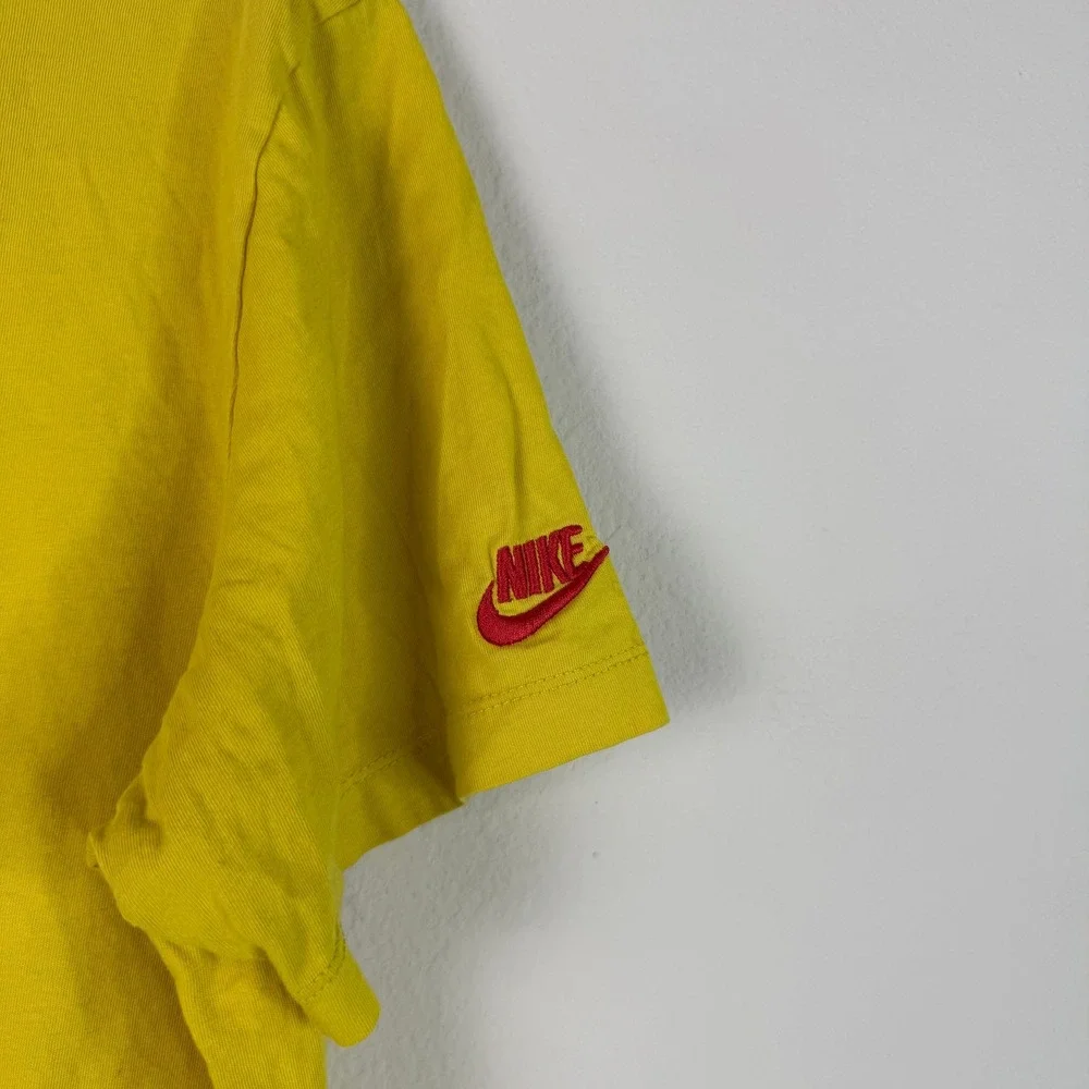 Nike T-Shirt Mens Large Yellow Multi Logo Graphic Short Sleeve Sportswear Tee